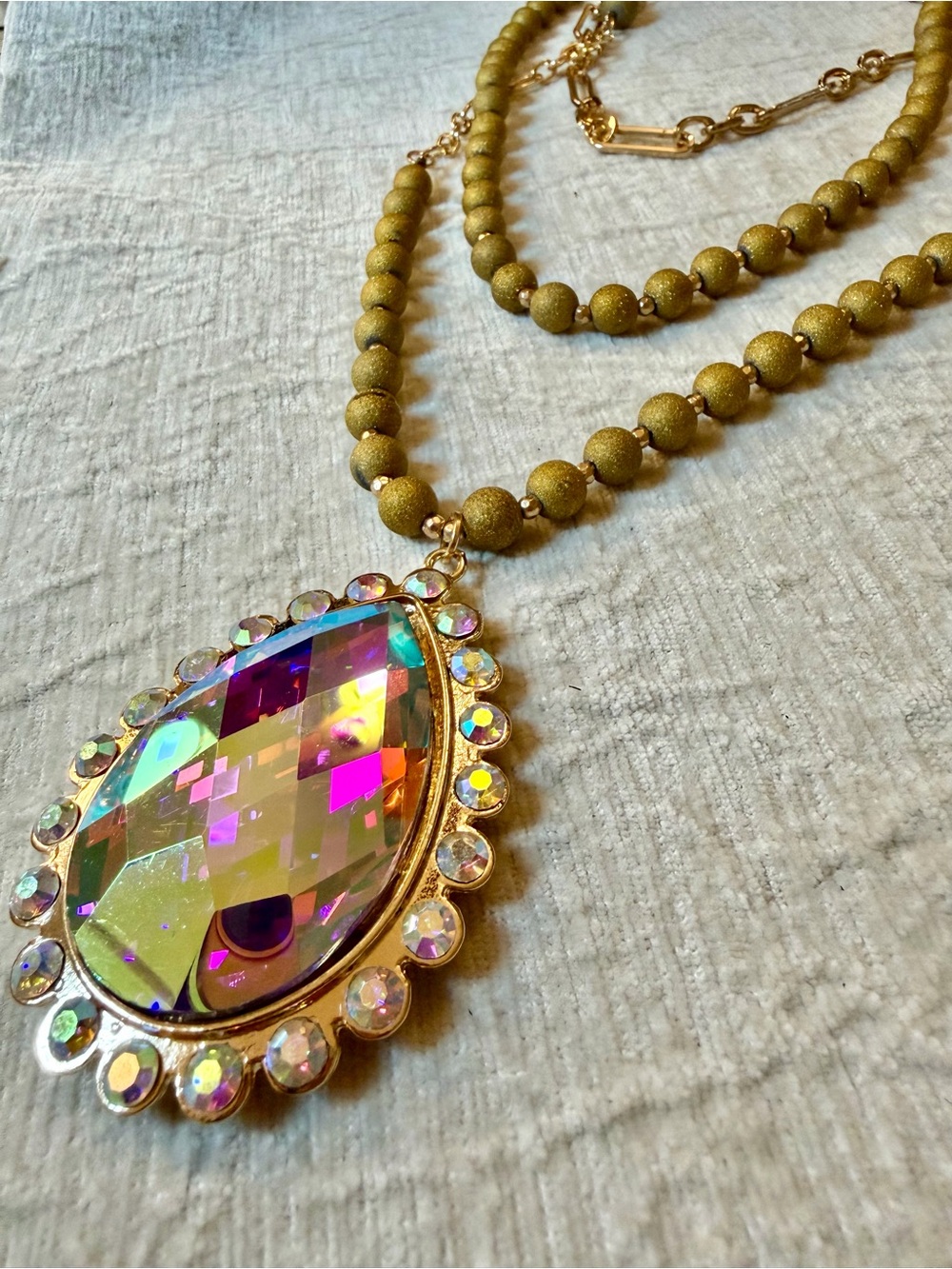 3 strand Layered Beaded Necklace with Iridescent Crystal Teardrop Pendant